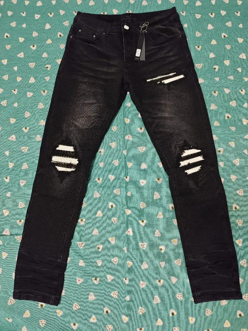 AMIRI Black Distressed Skinny Jeans with Knee Rips